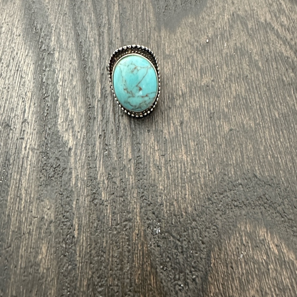 Turquoise Gemstone Ring with Silver Detailing